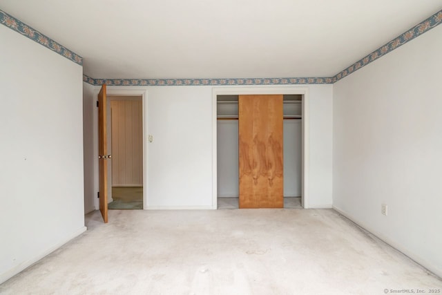 423 Baldwin Ave, Meriden, CT 06450 - unfurnished bedroom with carpet, baseboards, and a closet