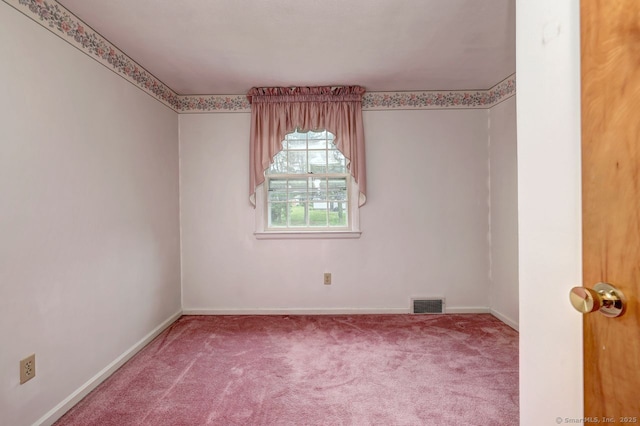 423 Baldwin Ave, Meriden, CT 06450 - carpeted spare room with baseboards