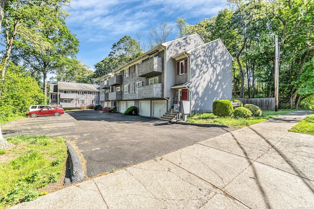 520 Vincellette St Unit C1, Bridgeport, CT 06606 - view of front of house with a garage