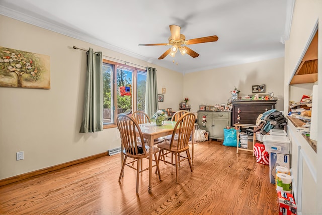520 Vincellette St Unit C1, Bridgeport, CT 06606 - dining space featuring ceiling fan, light wood-style flooring, crown molding, and baseboards