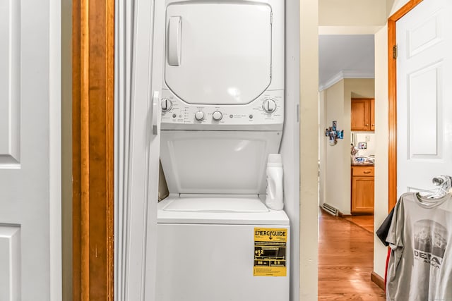 520 Vincellette St Unit C1, Bridgeport, CT 06606 - washroom featuring stacked washing machine and dryer and light wood-style flooring
