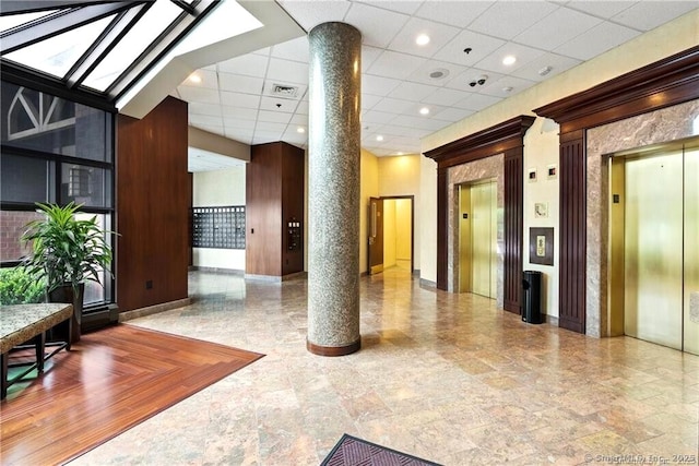 235 E River Dr Apt 502, East Hartford, CT 06108 - building lobby featuring a paneled ceiling