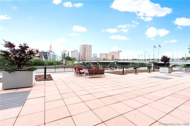235 E River Dr Apt 502, East Hartford, CT 06108 - view of patio / terrace featuring a city view