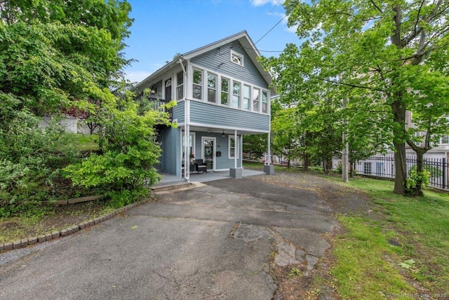 26 Shipyard Ln, Milford, CT 06460 - view of front facade featuring asphalt driveway