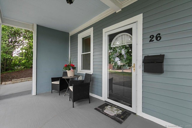 26 Shipyard Ln, Milford, CT 06460 - property entrance with a porch