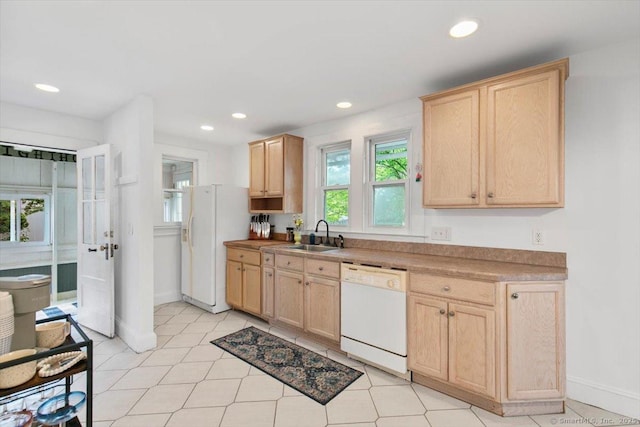 26 Shipyard Ln, Milford, CT 06460 - kitchen featuring white appliances, light brown cabinetry, a sink, baseboards, and recessed lighting