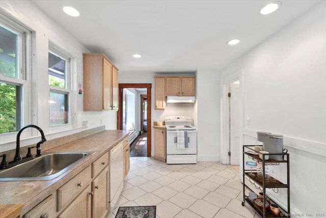 26 Shipyard Ln, Milford, CT 06460 - kitchen featuring white appliances, a sink, under cabinet range hood, light brown cabinetry, and baseboard heating