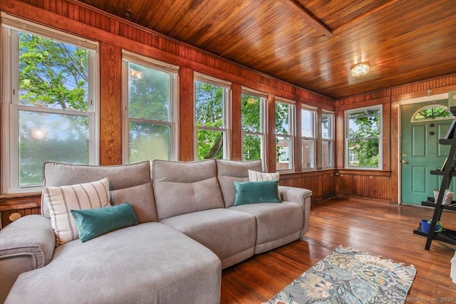 26 Shipyard Ln, Milford, CT 06460 - living area featuring plenty of natural light, wood walls, wooden ceiling, and wood-type flooring