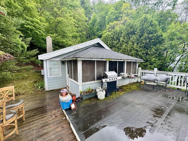 343 W Wakefield Blvd, Winchester, CT 06098 - wooden deck featuring a sunroom, a wooded view, and grilling area