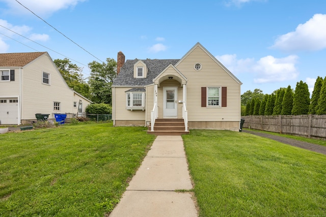 124 Jordan Ln, Wethersfield, CT 06109 - cape cod-style house featuring a chimney and roof with shingles