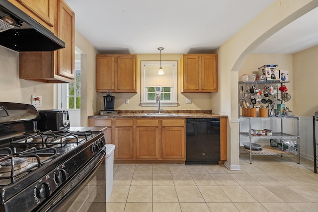 124 Jordan Ln, Wethersfield, CT 06109 - kitchen with black appliances, a sink, under cabinet range hood, and plenty of natural light