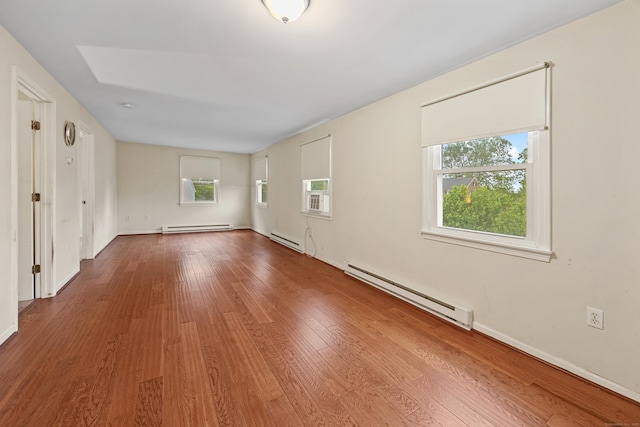 124 Jordan Ln, Wethersfield, CT 06109 - unfurnished room with baseboard heating, wood finished floors, and baseboards