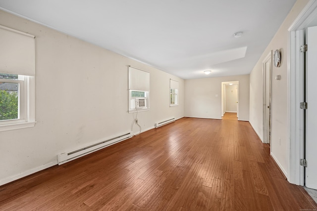 124 Jordan Ln, Wethersfield, CT 06109 - unfurnished room with a baseboard radiator, wood finished floors, a smoke detector, and baseboards