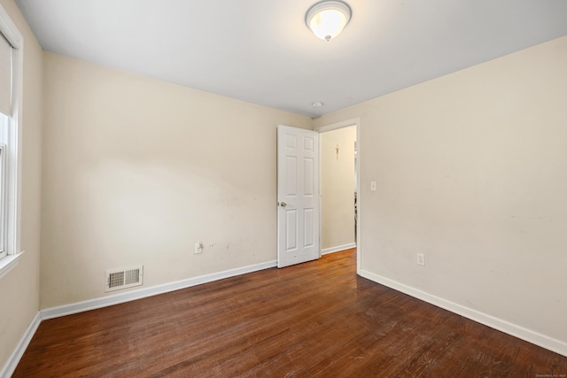 124 Jordan Ln, Wethersfield, CT 06109 - empty room featuring baseboards and wood finished floors