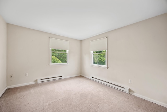 124 Jordan Ln, Wethersfield, CT 06109 - carpeted empty room with a baseboard heating unit and baseboards