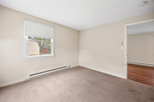 124 Jordan Ln, Wethersfield, CT 06109 - carpeted spare room with a baseboard heating unit, baseboards, and a smoke detector