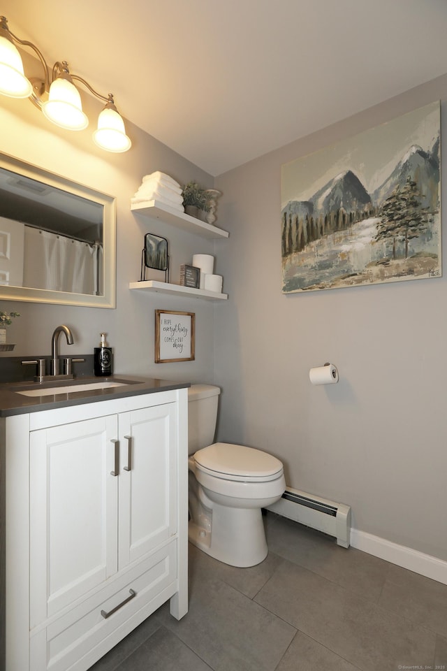 18 Totoket Rd, Waterford, CT 06375 - bathroom with a baseboard radiator, toilet, tile patterned floors, vanity, and baseboards