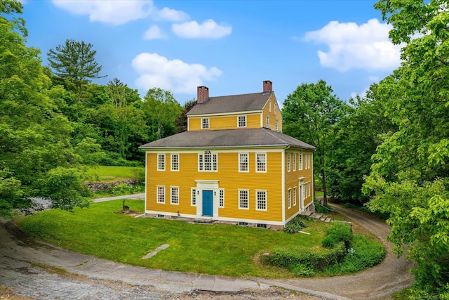 89 John Perry Rd, Eastford, CT 06242 - view of front facade featuring a chimney, a front yard, and roof with shingles