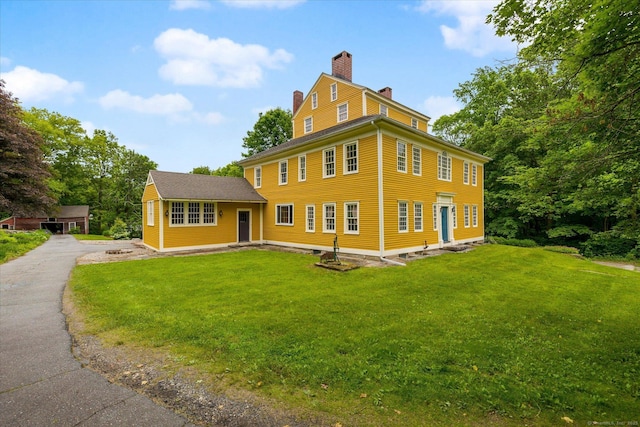 89 John Perry Rd, Eastford, CT 06242 - view of front of home with a chimney and a front yard
