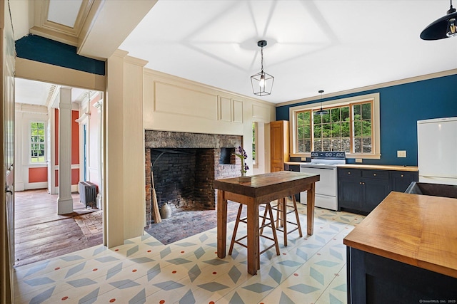 89 John Perry Rd, Eastford, CT 06242 - kitchen with electric stove, fridge, healthy amount of natural light, and light floors