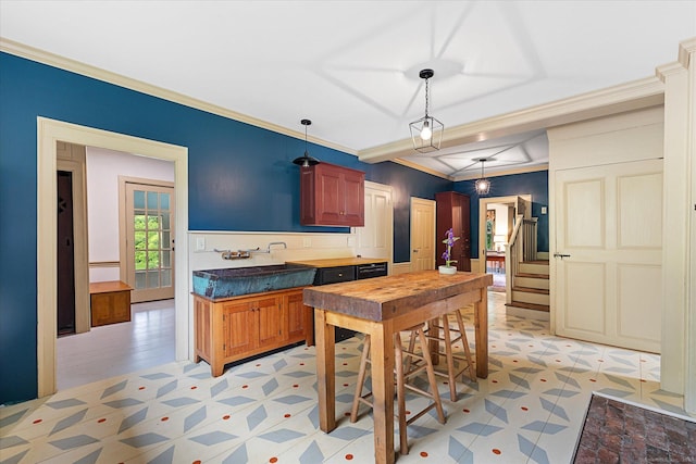 89 John Perry Rd, Eastford, CT 06242 - kitchen with crown molding, hanging light fixtures, dark countertops, a sink, and light floors