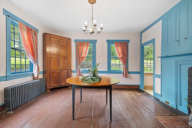 89 John Perry Rd, Eastford, CT 06242 - dining space featuring radiator, dark wood-type flooring, a chandelier, and plenty of natural light