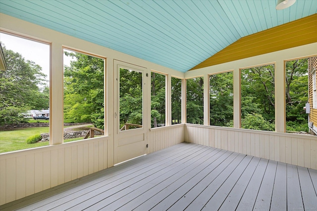 89 John Perry Rd, Eastford, CT 06242 - unfurnished sunroom with lofted ceiling and view of scattered trees