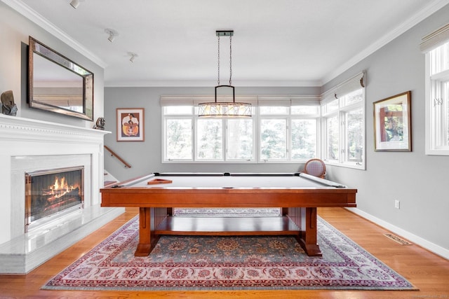 94 Southpond Rd, Glastonbury, CT 06073 - rec room featuring billiards, crown molding, light wood-style floors, a glass covered fireplace, and baseboards