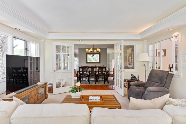 94 Southpond Rd, Glastonbury, CT 06073 - living area featuring a chandelier and crown molding