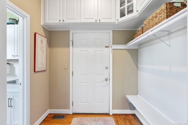 94 Southpond Rd, Glastonbury, CT 06073 - mudroom with light wood finished floors and baseboards