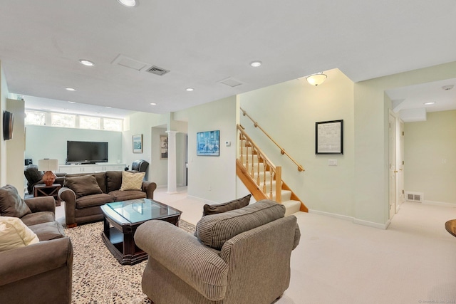 94 Southpond Rd, Glastonbury, CT 06073 - living area featuring recessed lighting, stairway, light colored carpet, baseboards, and decorative columns