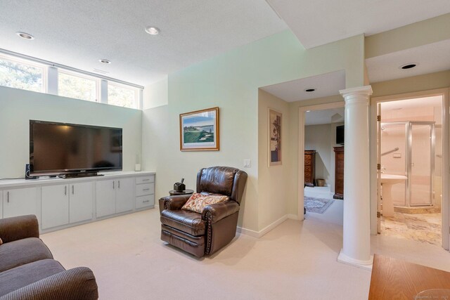 94 Southpond Rd, Glastonbury, CT 06073 - living room featuring decorative columns, light colored carpet, recessed lighting, and baseboards