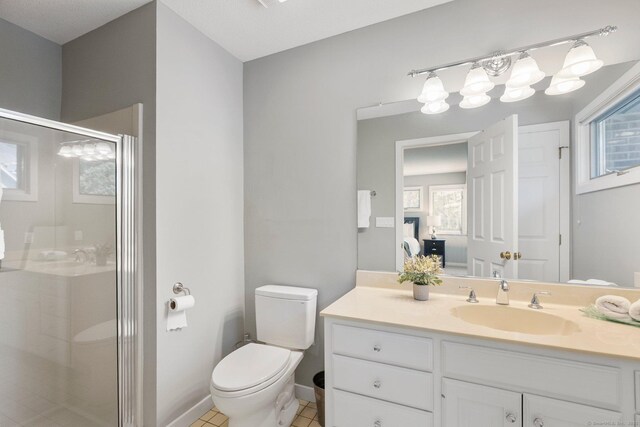 94 Southpond Rd, Glastonbury, CT 06073 - bathroom with vanity, a stall shower, toilet, and healthy amount of natural light