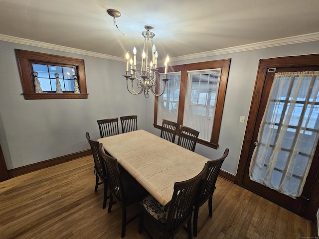 58 Waverly Pl, Bridgeport, CT 06610 - dining room with a chandelier, baseboards, wood finished floors, and crown molding