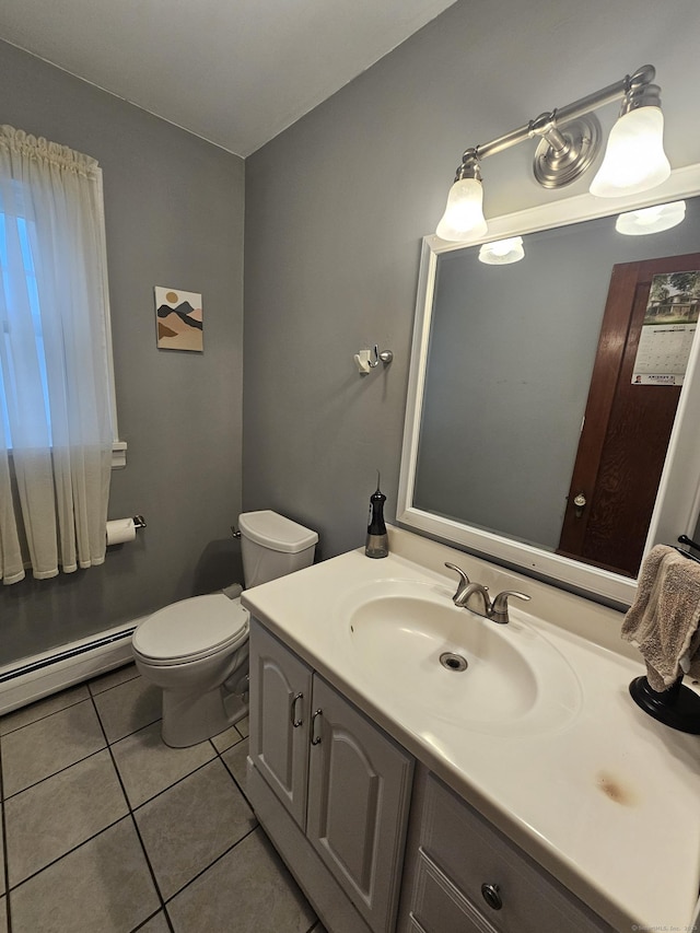 58 Waverly Pl, Bridgeport, CT 06610 - half bathroom featuring tile patterned floors, vanity, a baseboard heating unit, and toilet