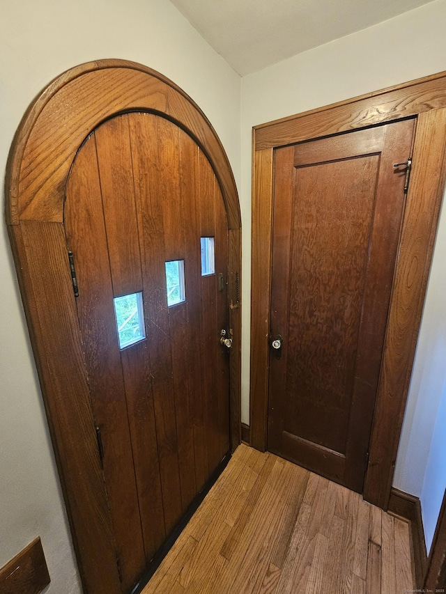 58 Waverly Pl, Bridgeport, CT 06610 - foyer with wood finished floors and arched walkways