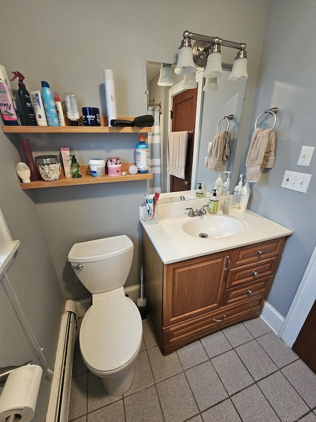 58 Waverly Pl, Bridgeport, CT 06610 - bathroom with a baseboard heating unit, vanity, toilet, and baseboards