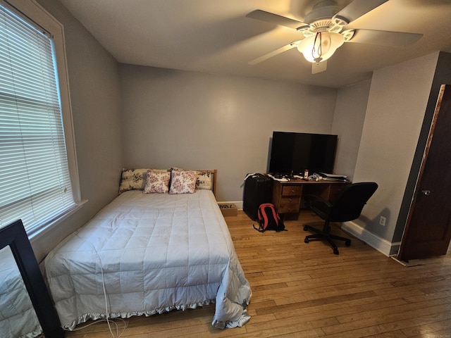 58 Waverly Pl, Bridgeport, CT 06610 - bedroom with wood finished floors, a ceiling fan, and baseboards