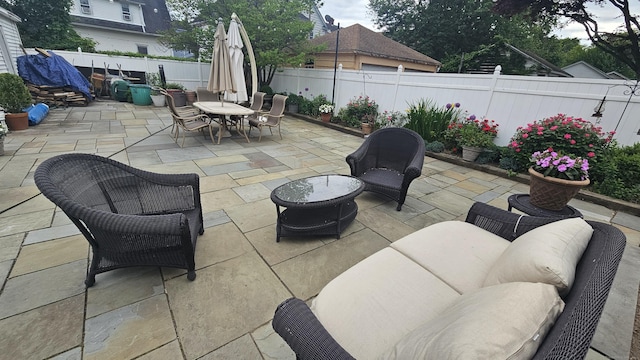 58 Waverly Pl, Bridgeport, CT 06610 - fenced backyard with a patio area, an outdoor living space, and outdoor dining area