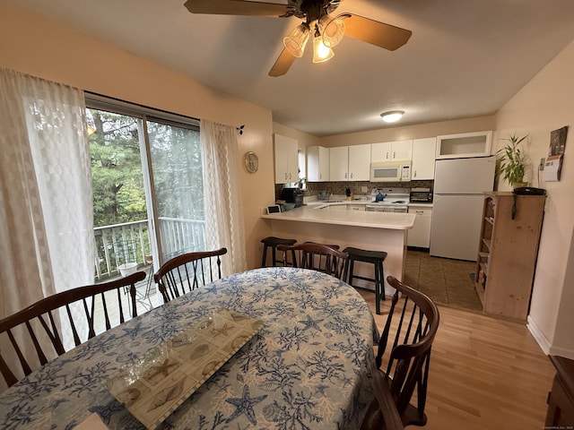 925 Oronoke Rd Unit 12G, Waterbury, CT 06708 - dining space featuring ceiling fan, light wood finished floors, and baseboards