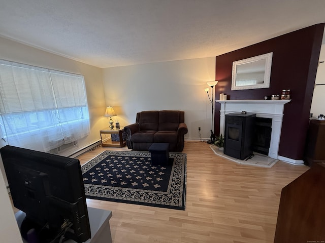 925 Oronoke Rd Unit 12G, Waterbury, CT 06708 - living area with light wood finished floors, baseboard heating, and baseboards