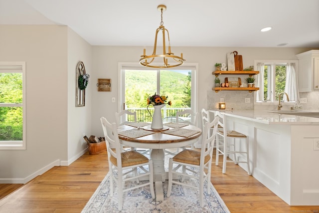 6 Lee Cir, Kent, CT 06757 - dining space with healthy amount of natural light, light wood finished floors, a chandelier, and recessed lighting