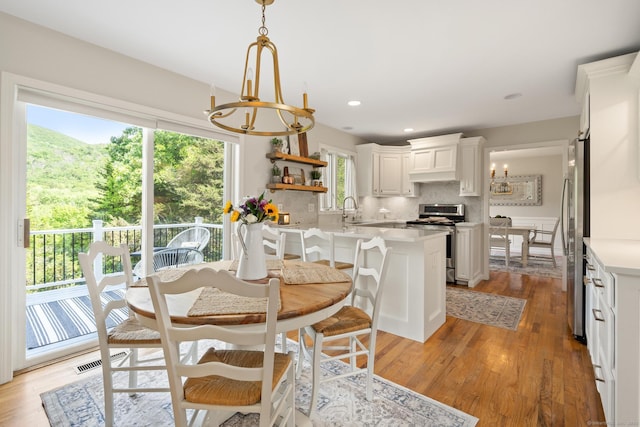 6 Lee Cir, Kent, CT 06757 - dining space featuring a chandelier, light wood-style floors, and recessed lighting