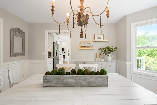 6 Lee Cir, Kent, CT 06757 - dining room featuring a wainscoted wall, a chandelier, and a decorative wall