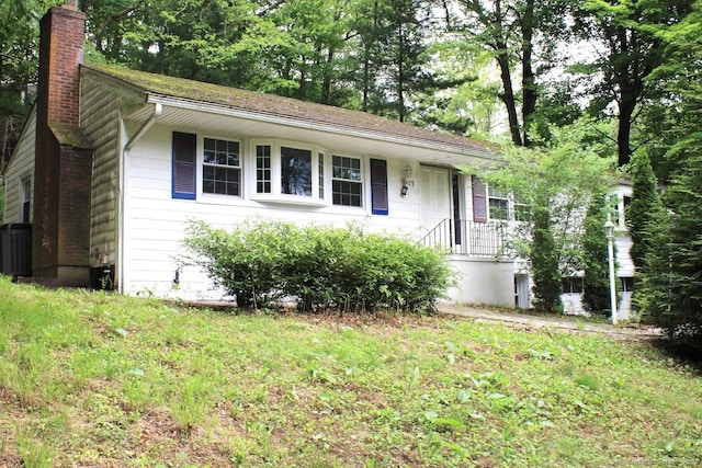 73 Devils Garden Rd, Norwalk, CT 06854 - single story home featuring a chimney