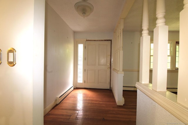 73 Devils Garden Rd, Norwalk, CT 06854 - foyer with a baseboard heating unit, wood finished floors, and baseboard heating