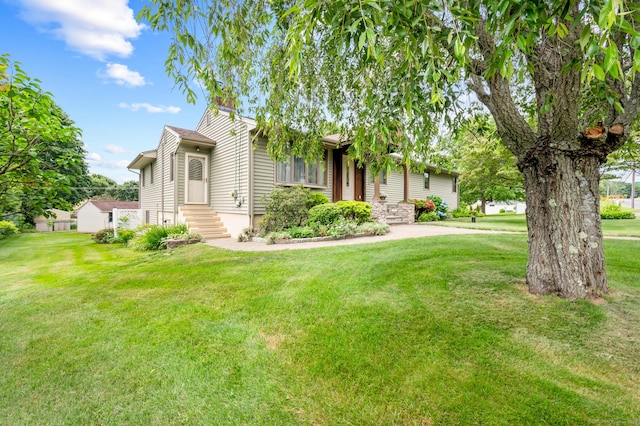 223 Beach Rd, Wolcott, CT 06716 - view of front of property with a front lawn