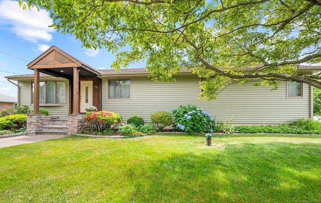223 Beach Rd, Wolcott, CT 06716 - ranch-style home with a front yard