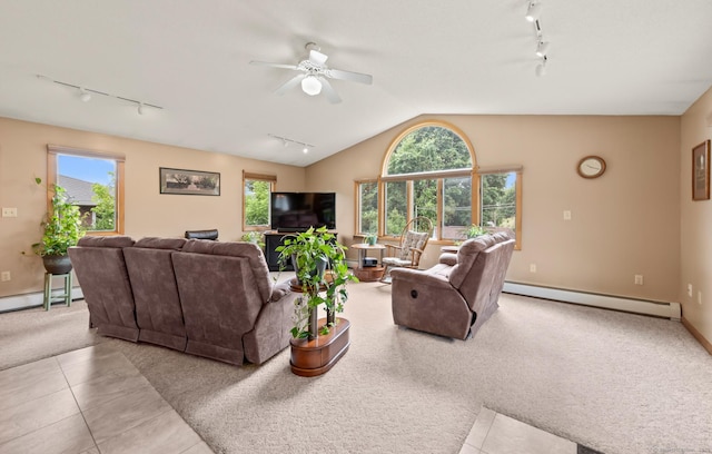 223 Beach Rd, Wolcott, CT 06716 - tiled living room with rail lighting, a baseboard heating unit, ceiling fan, lofted ceiling, and a baseboard radiator