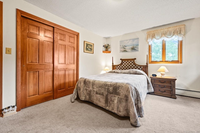 223 Beach Rd, Wolcott, CT 06716 - bedroom featuring a baseboard radiator, carpet floors, and a textured ceiling
